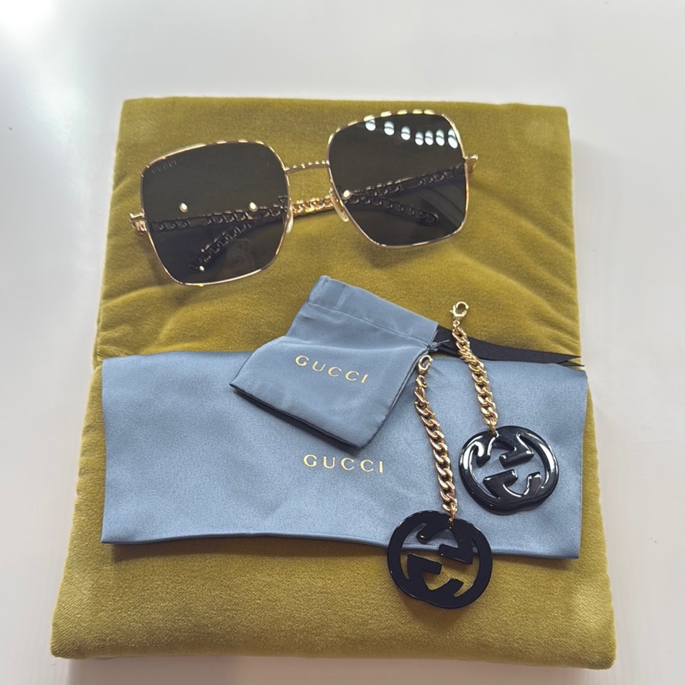 Gucci Gold Sunglasses with Chain Detail